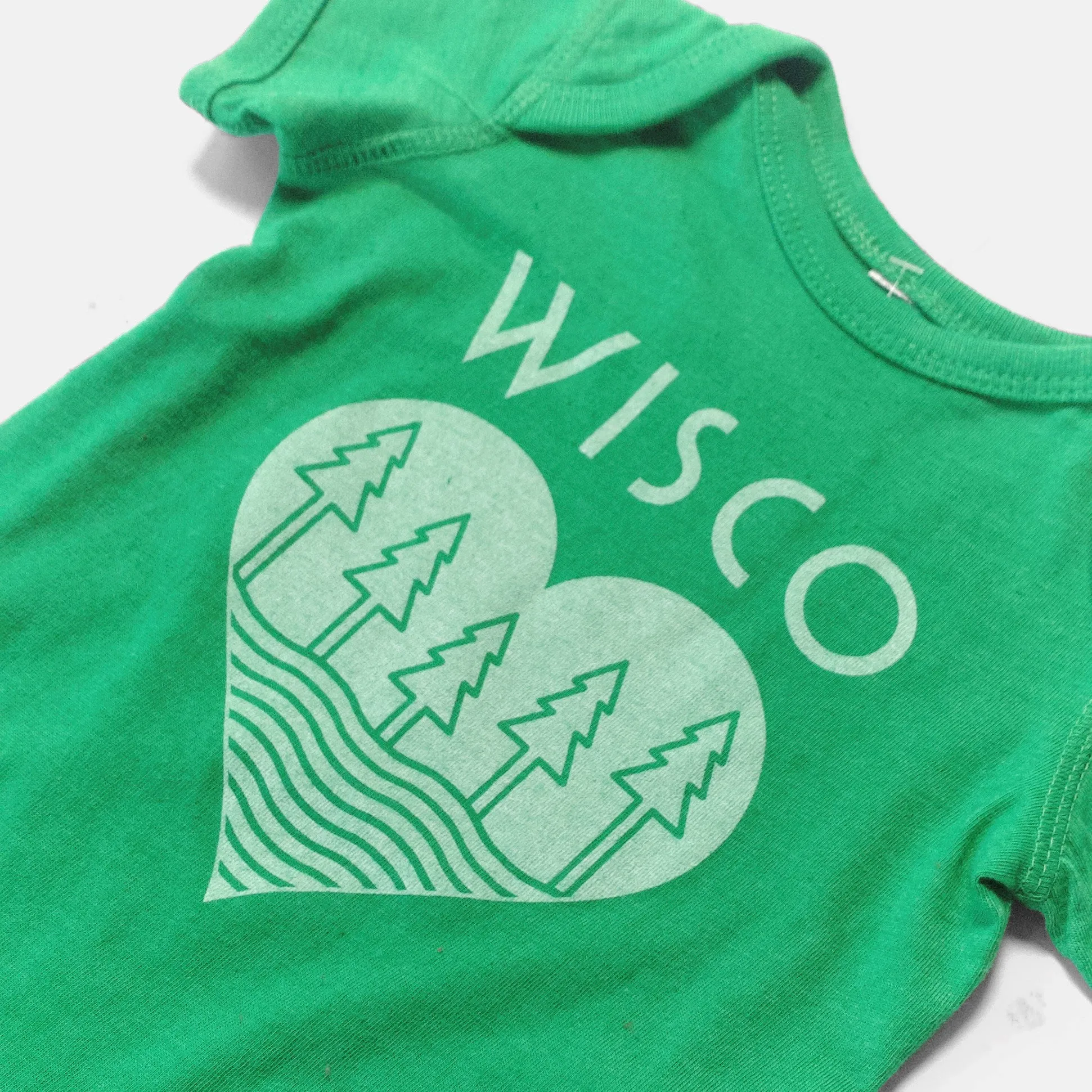 The Wisco Roots Green Onesie